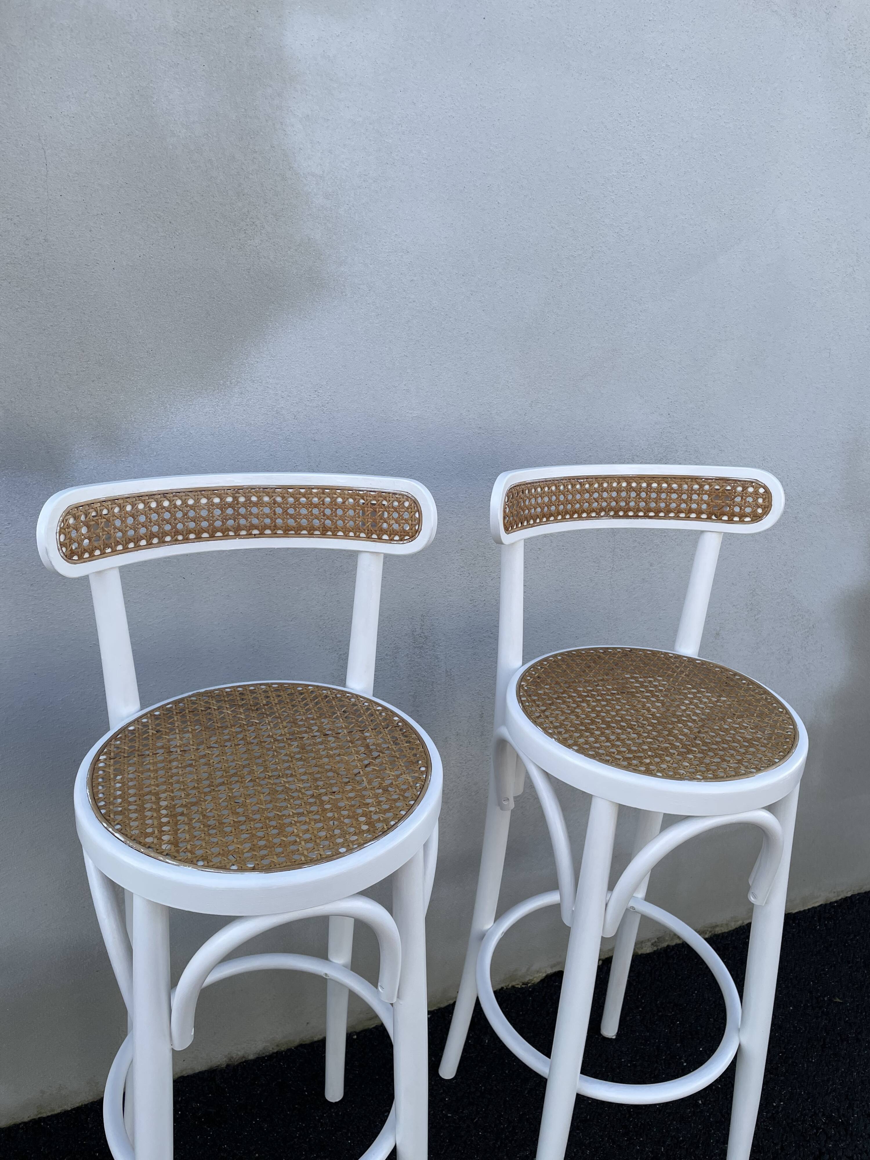High stools in cane and curved wood 1970-1980