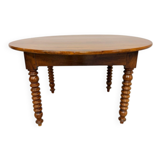 Oval dining table in solid wood with turned legs from the 1950s.