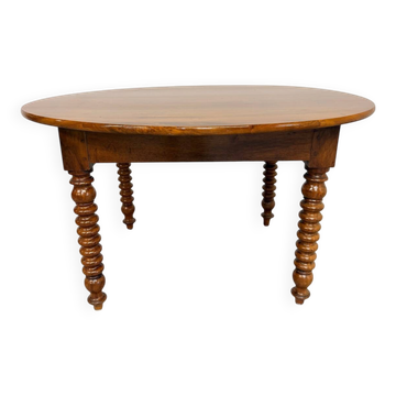 Oval dining table in solid wood with turned legs from the 1950s.