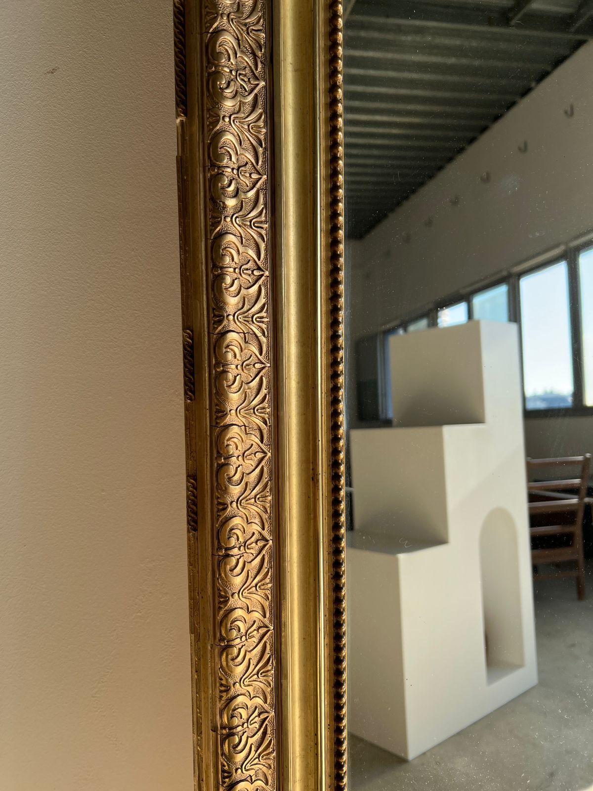 Gilded mirror with frieze h2m10 l:73cm