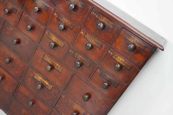 Armoire d'apothicaire / commode à tiroirs en bois dur antique, Angleterre, XIXe siècle
