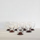 Set of 8 art deco wine or water glasses and red-brown coloured foot