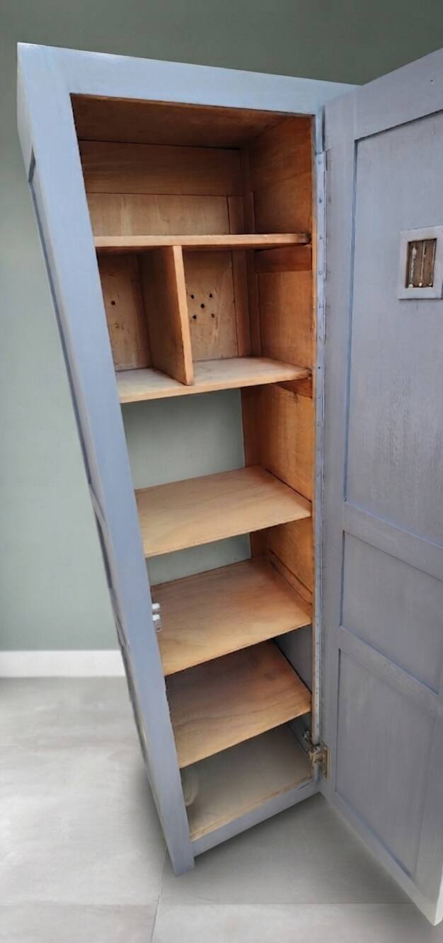 Vintage grey wooden wardrobe from 1914.