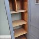 Vintage grey wooden wardrobe from 1914.