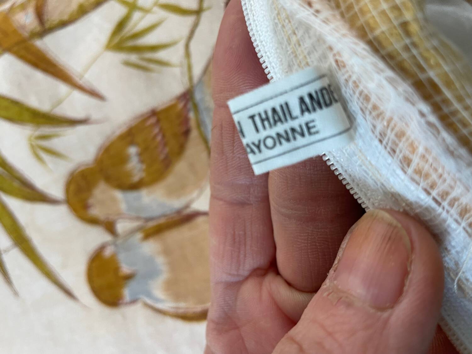 Vintage cushion decorated with birds, Thailand