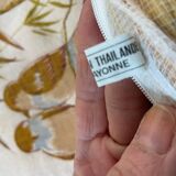 Vintage cushion decorated with birds, Thailand