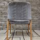 Vintage armchair from the 60s/70s in wood and grey fabric – with armrests.