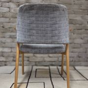 Vintage armchair from the 60s/70s in wood and grey fabric – with armrests.