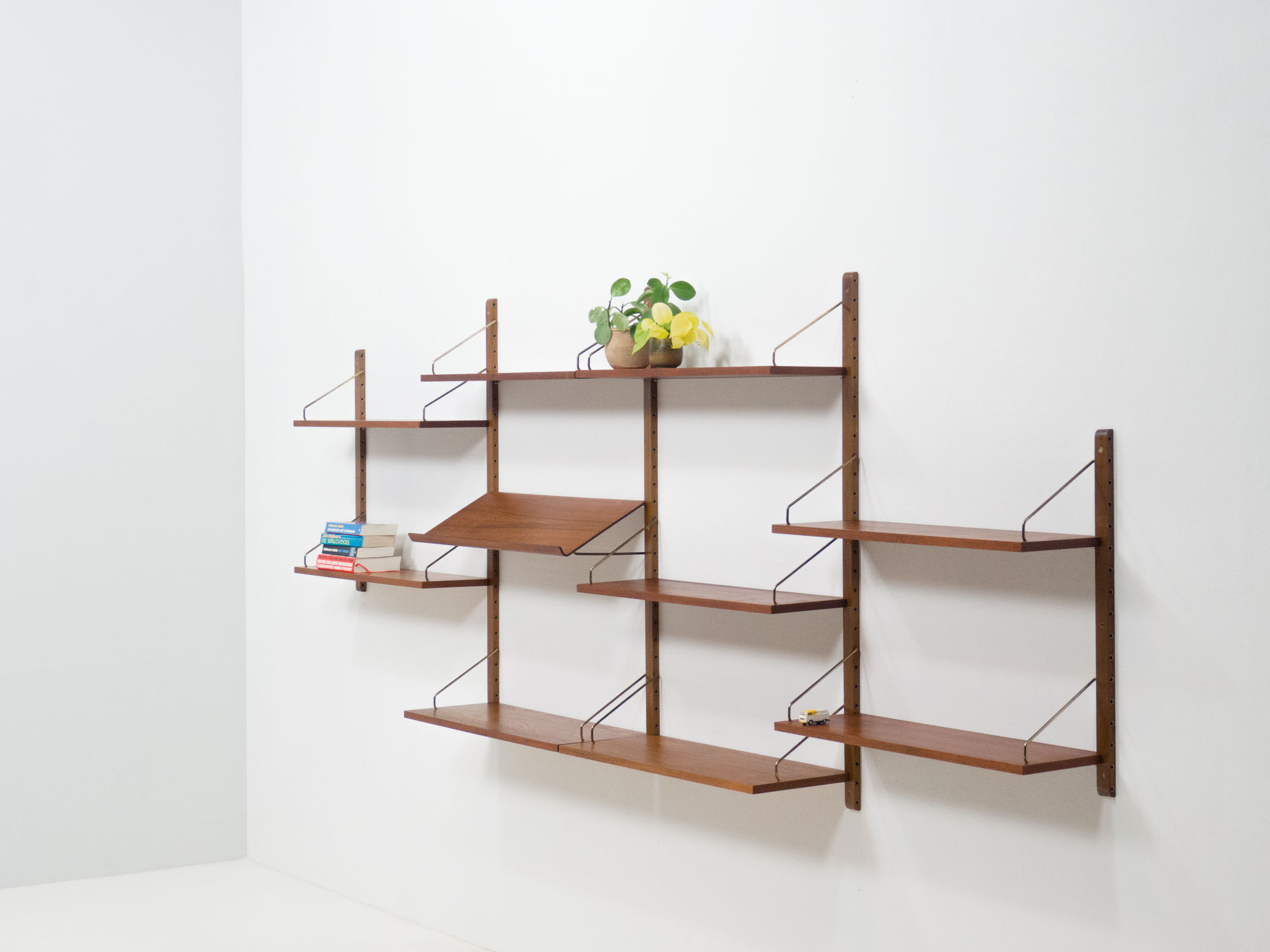 Royal System teak wall unit by Poul Cadovius