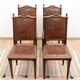 Set of 4 Louis XVI style chairs in carved wood and embossed leather.