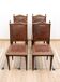Set of 4 Louis XVI style chairs in carved wood and embossed leather.