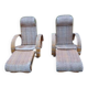 Pair of colonial rattan deck chairs