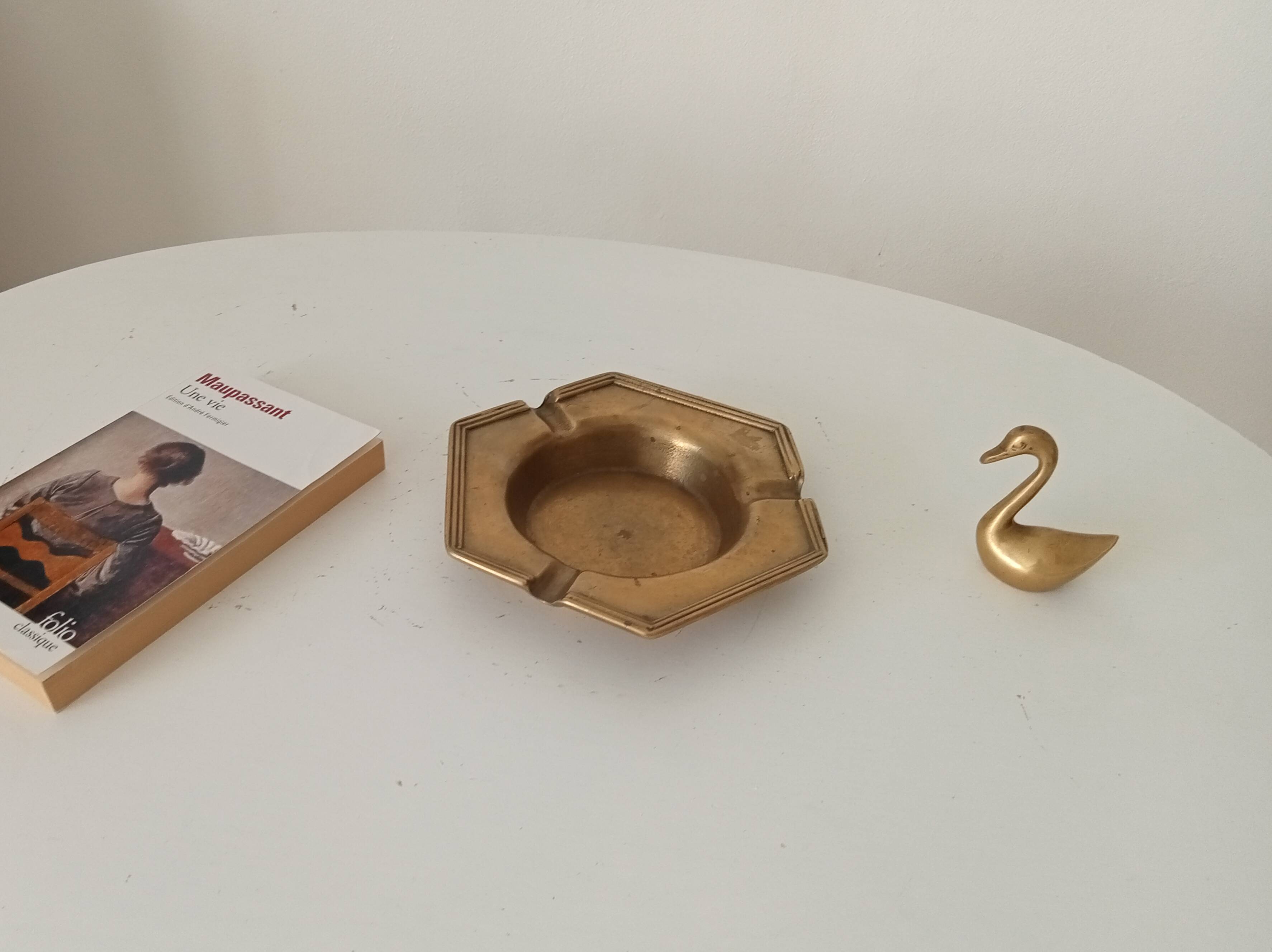 Antique ashtray in solid gilded brass