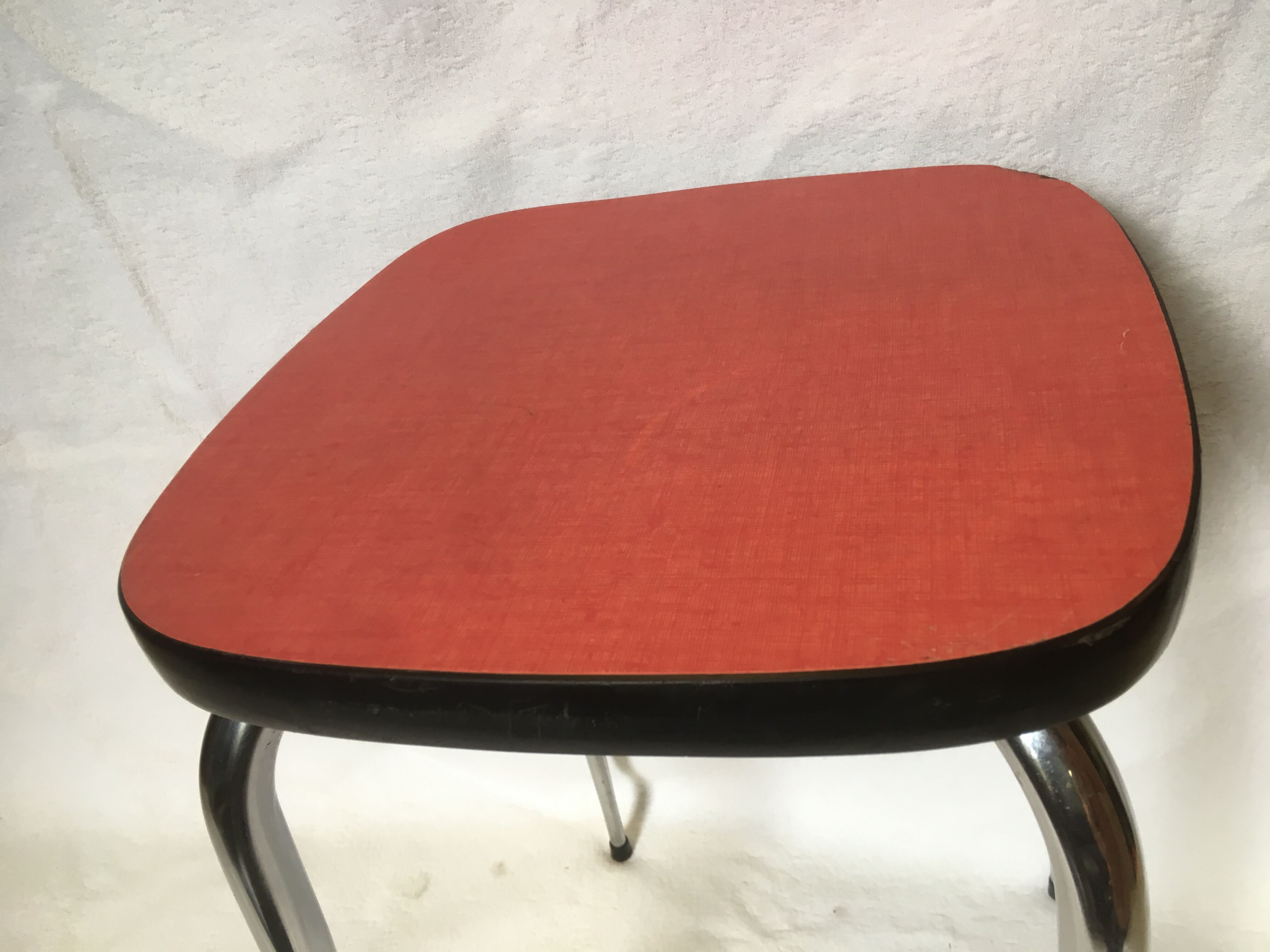 Vintage stool in red formica chrome feet