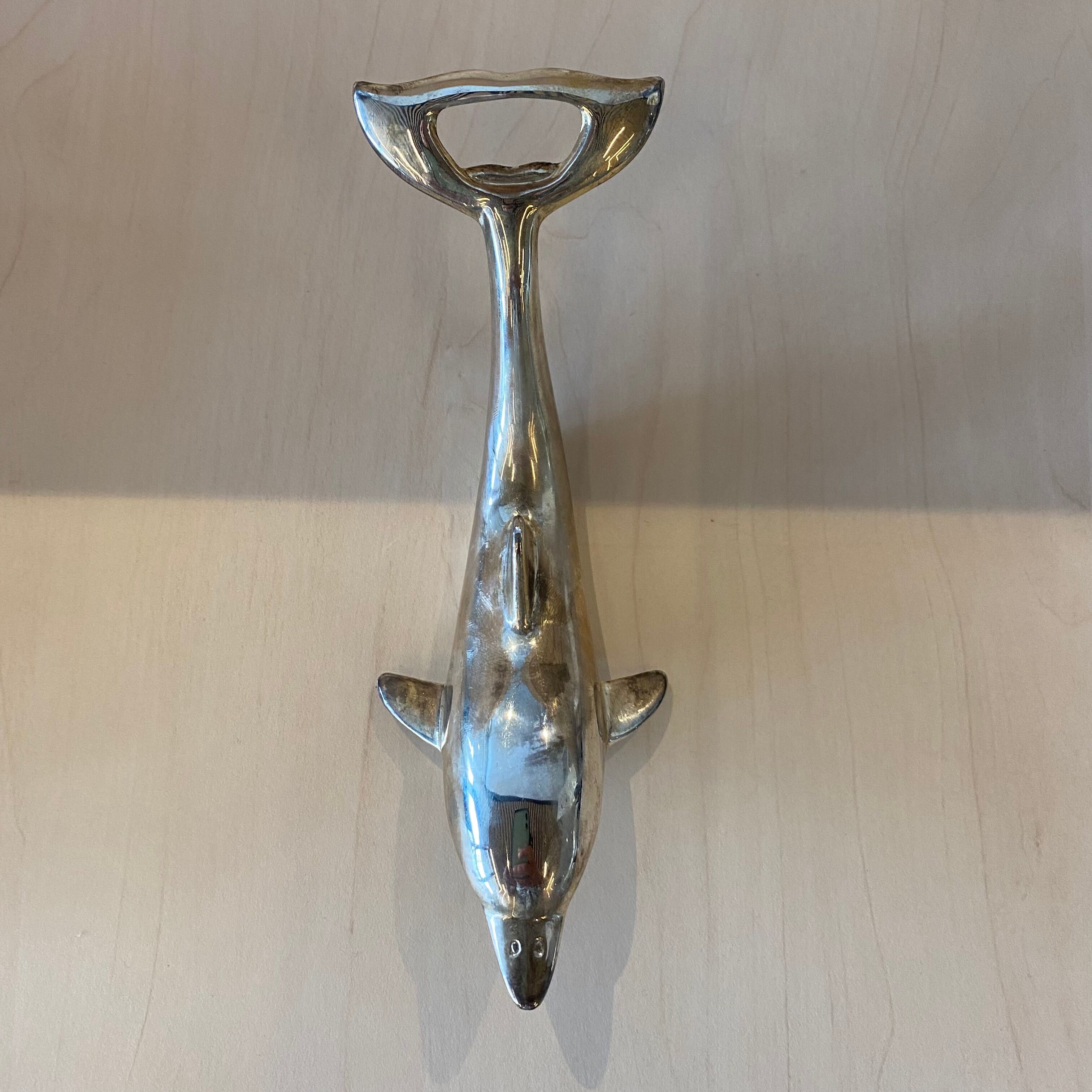 Vintage bottle opener dolphin