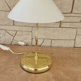 Articulated brass and opaline lamp.