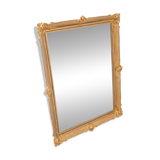 Large French mirror in a gold frame.