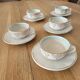 5 antique cups and saucers