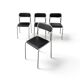 Bauhaus-style tubular steel chairs with black faux leather upholstery, Italian modernist dining room