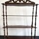 Large Napoleon III shelf in turned wood with a pediment.