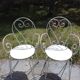 Paire de fauteuils en métal