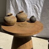 Natural solid mango side table (monoxyle) with conical legs.
