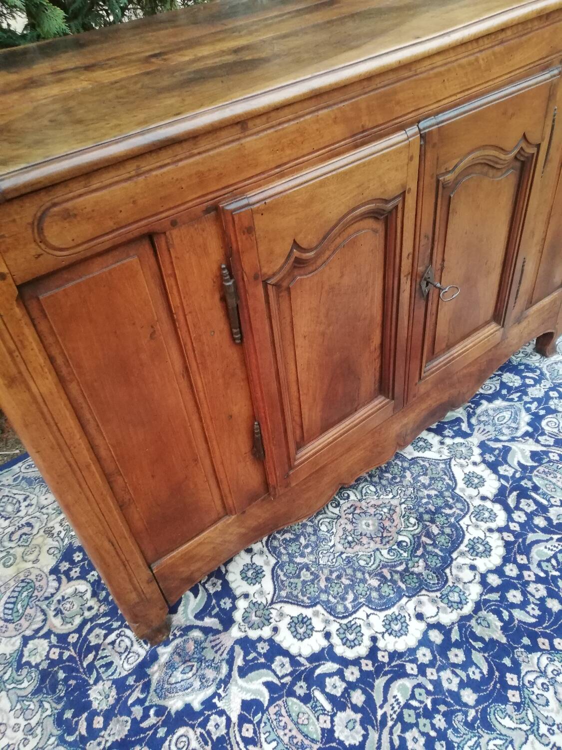 A Louis XV walnut sideboard
