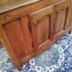 A Louis XV walnut sideboard