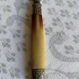Horn and metal salad servers from the 1920s