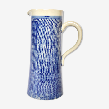 Blue textured ceramic pitcher
