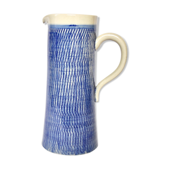 Blue textured ceramic pitcher