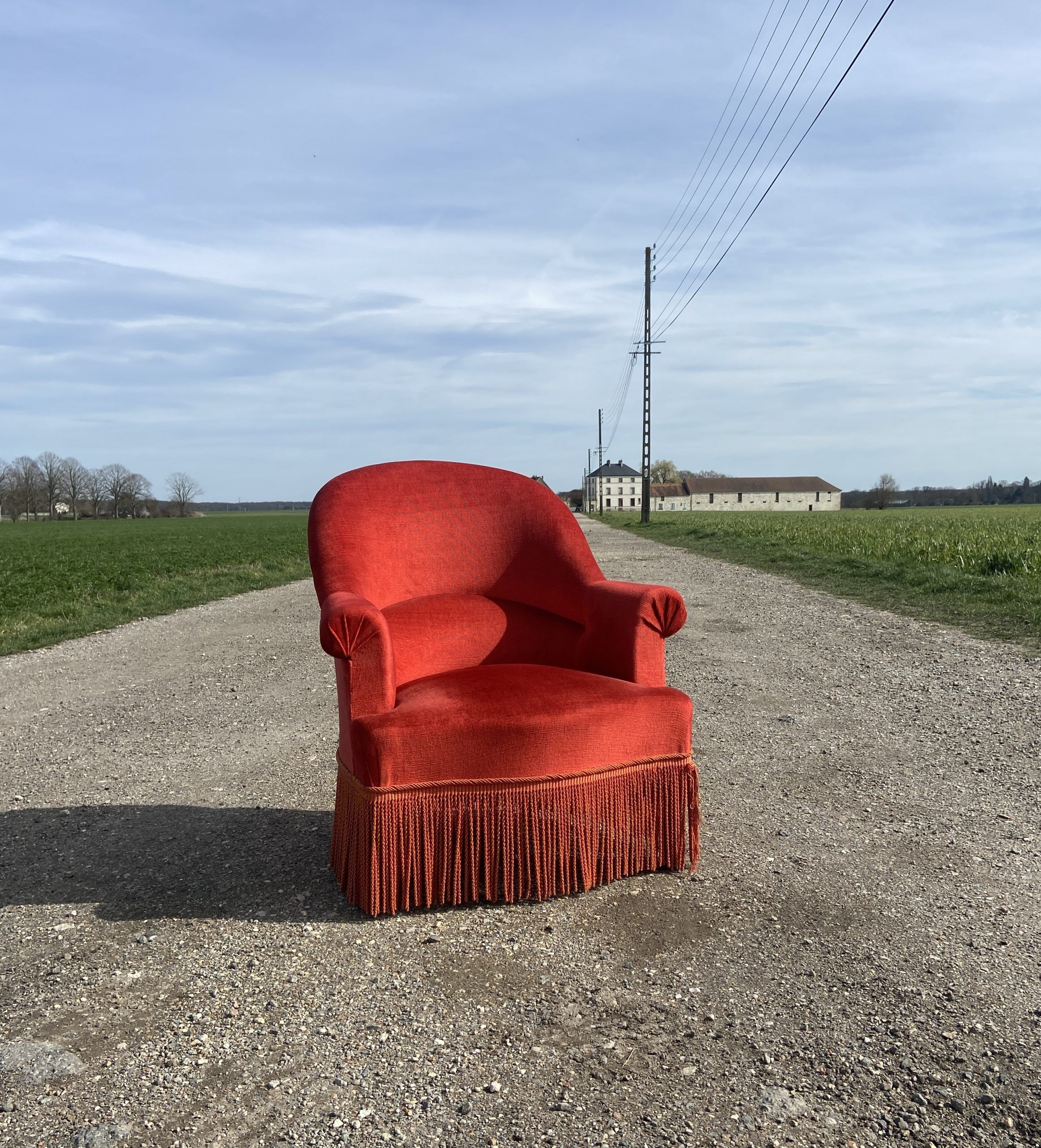 Vintage toad armchair with brick red velvet fringes