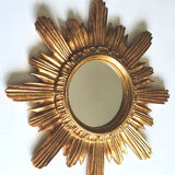 Sun mirror in gilded wood