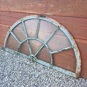 Old wrought iron full riveted gates from the 19th century.