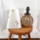 Lampe boule rotin et herbier