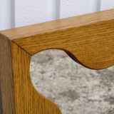 Large antique mirror with an oak frame.