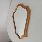 Vintage baroque mirror in gilded wood