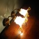 Wall lamps, opaque corolla and iridescent ochre lampshade, brass and wood support