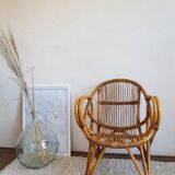 Rattan armchair and vintage Wicker-compass feet
