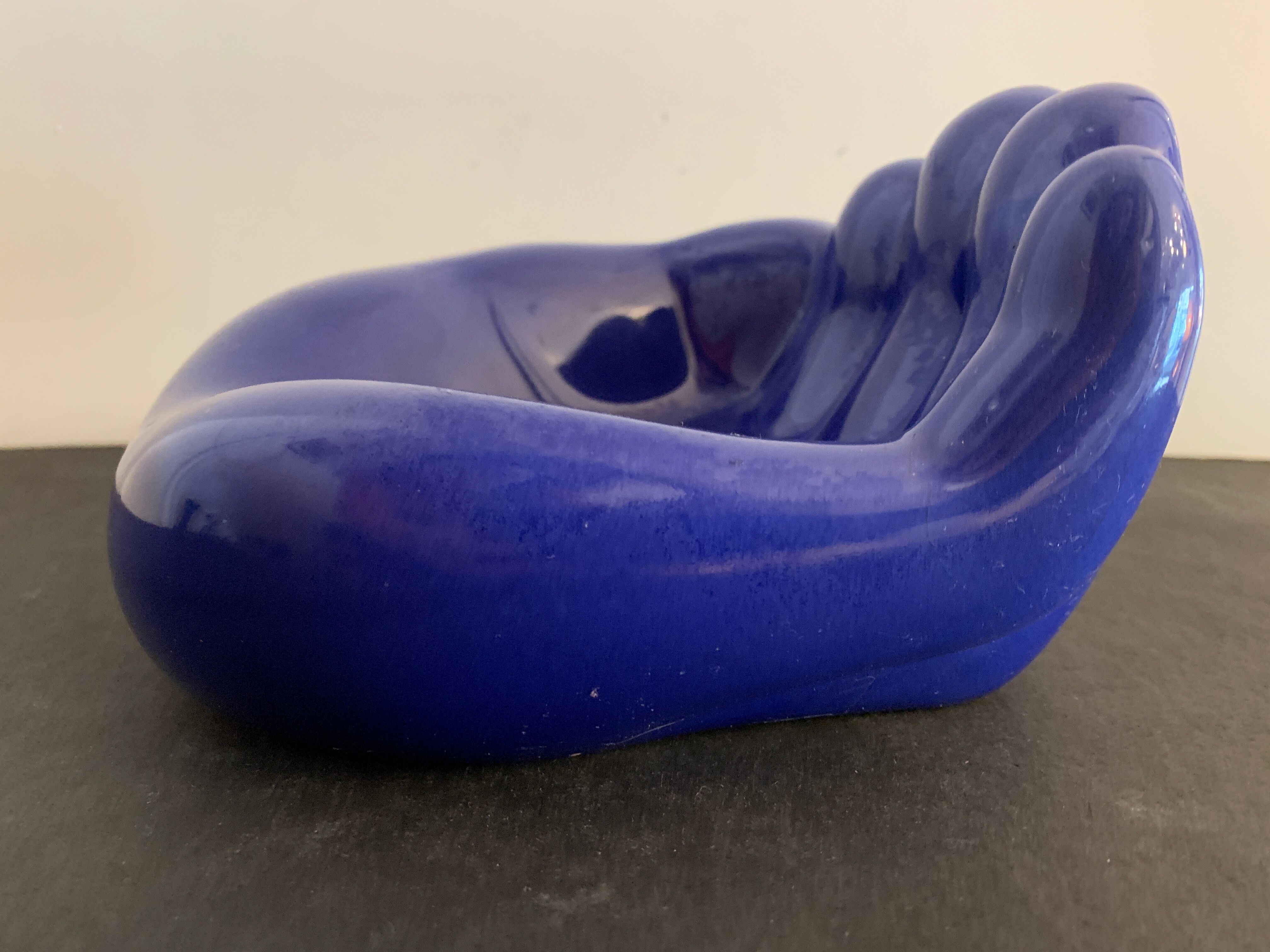 Ceramic ashtray, blue hand shape