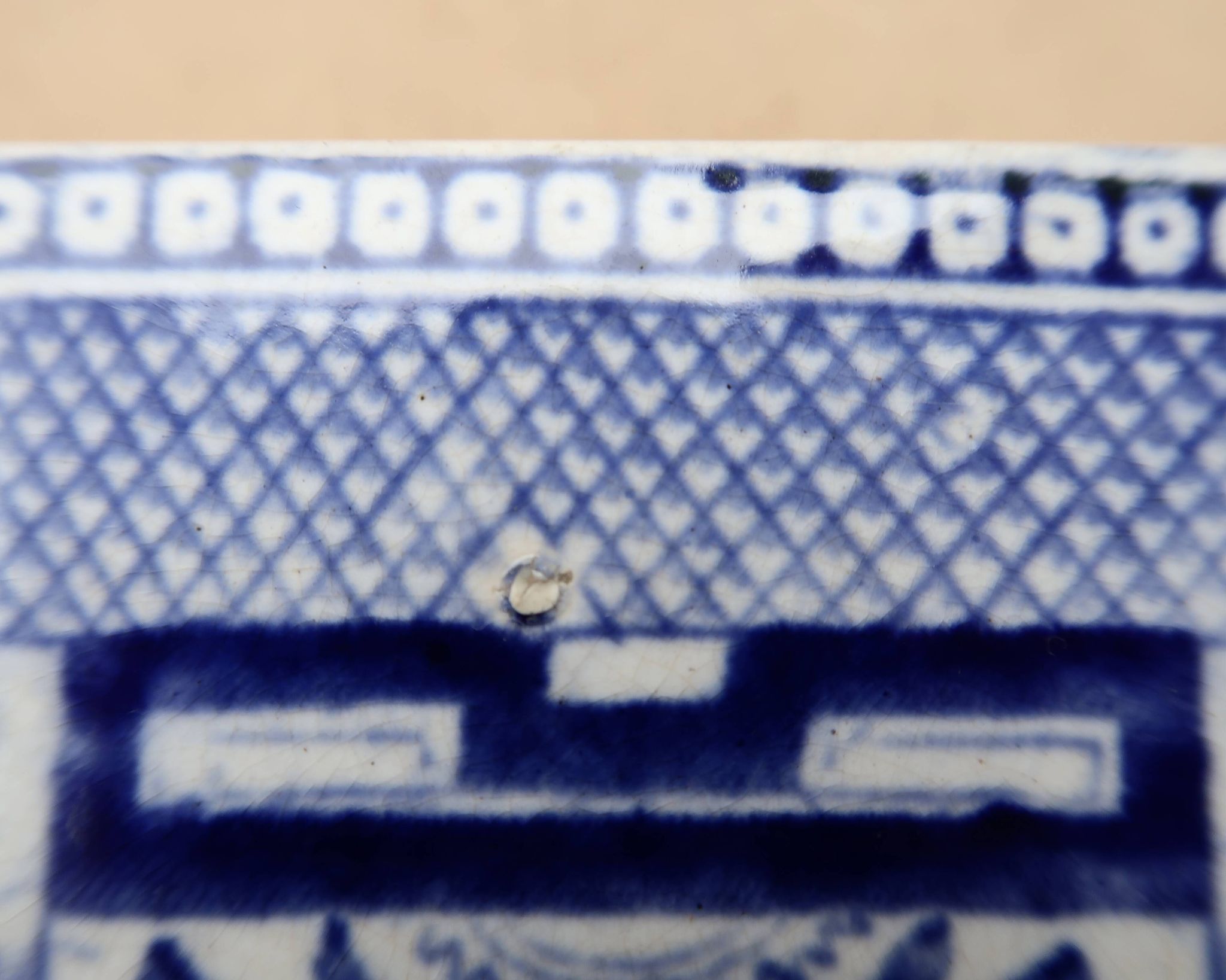 Large oval dish in blue and white English earthenware with Asian decoration, 19th century.