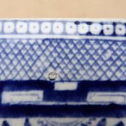 Large oval dish in blue and white English earthenware with Asian decoration, 19th century.