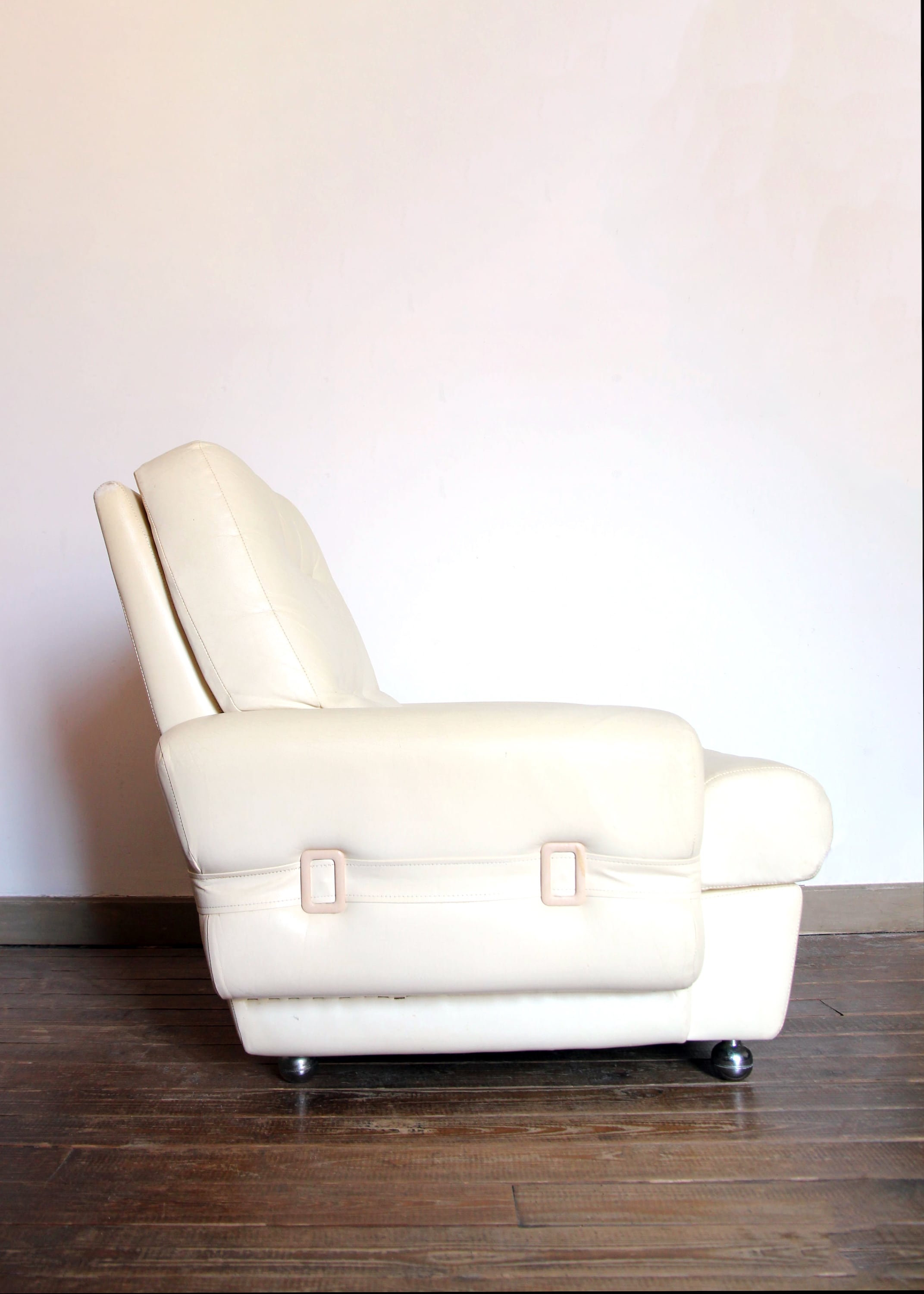 Seventies armchair in cream white skaï