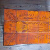 Wrought iron and orange ceramic coffee table