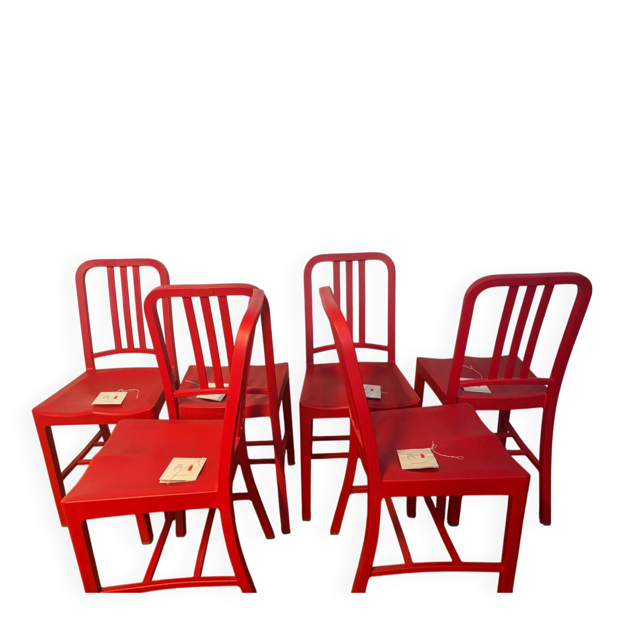 Set of 6 red Emeco chairs