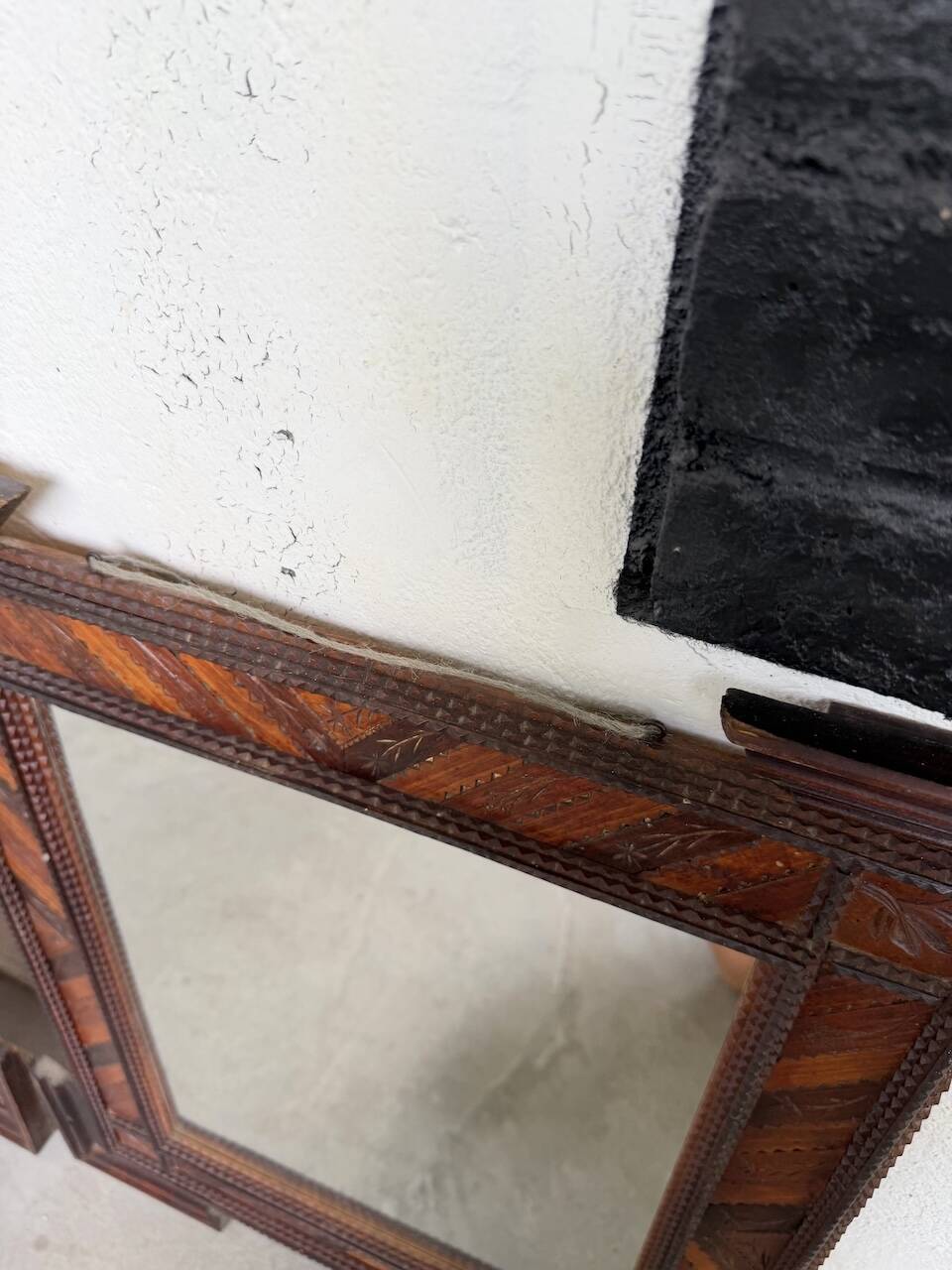 Pair of wooden mirrors in tramp art style