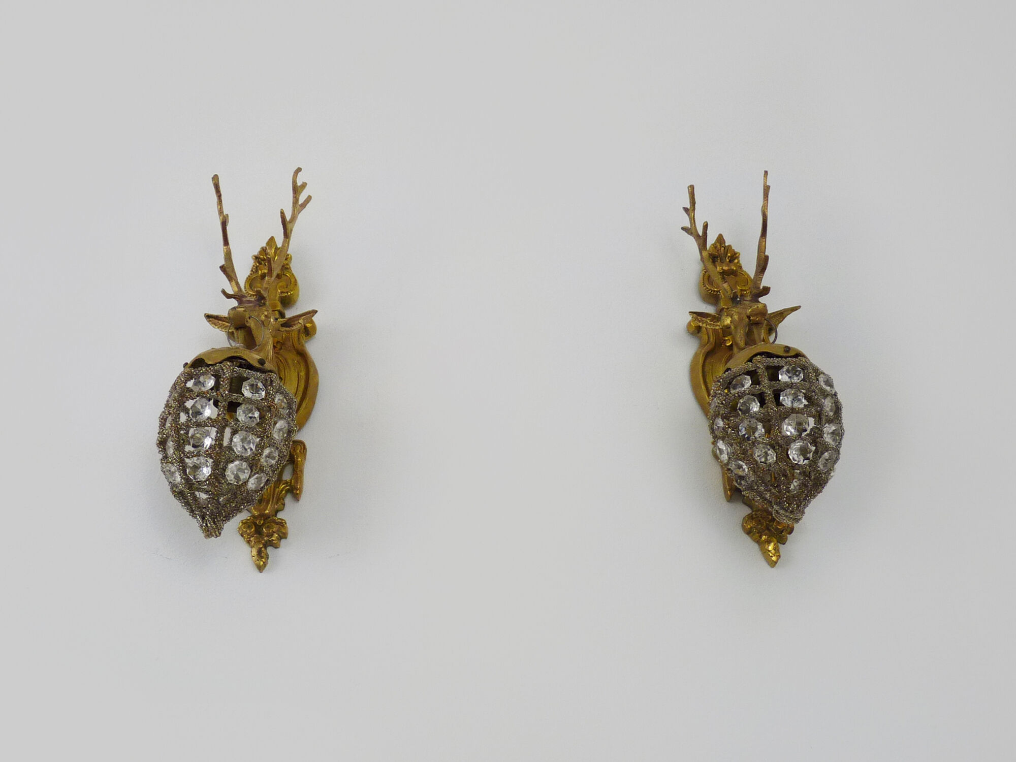 Pair of vintage wall lamps with pearl deer head and glass grapevines