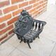 Antique black cast iron log cradle in rococo style