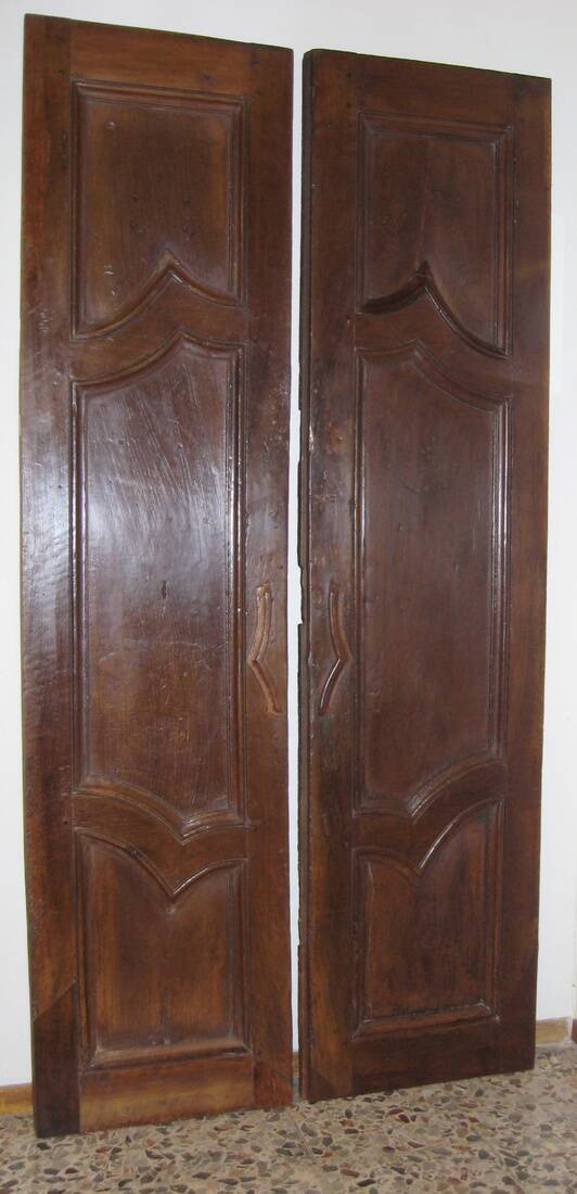 Pair of antique solid walnut doors from the 18th century.