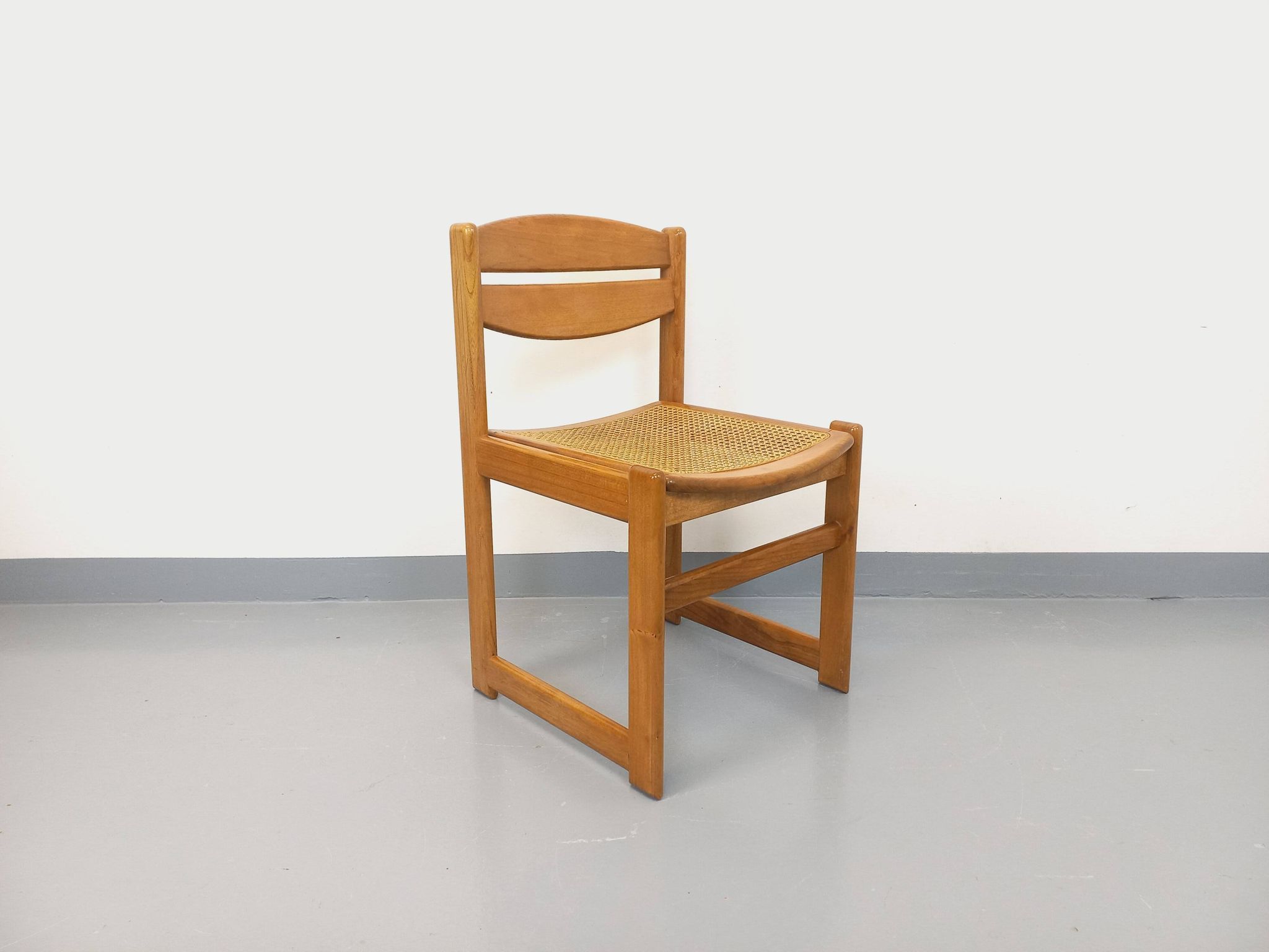 Vintage sleigh chair in beech wood and cane from the 70s and 80s